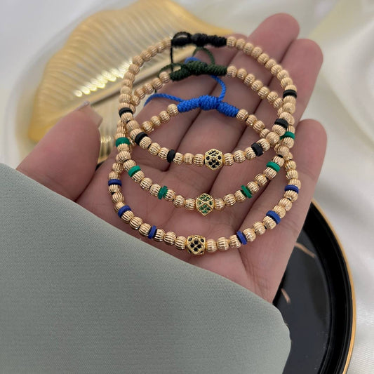 Manilla luxury, elaborándola con 40. Balines fraces 4mm, 6. Fimo