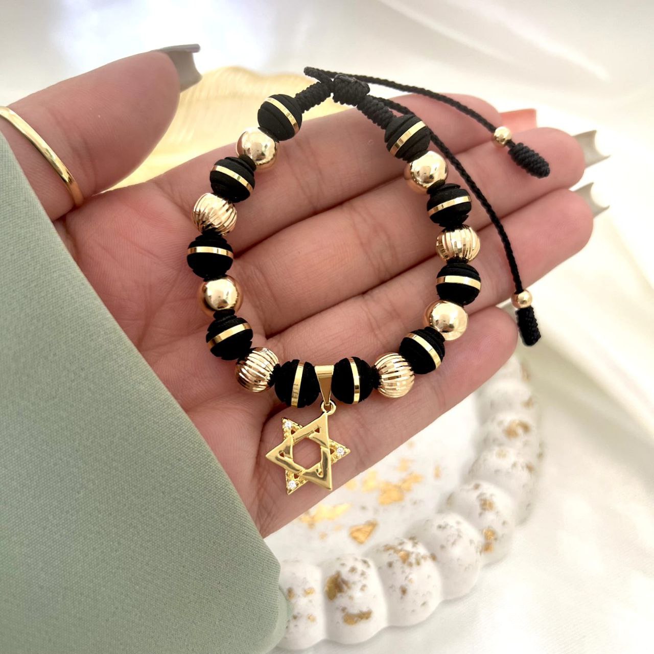 Manilla elaborada con 4 balines 8mm fc, 4 balines 8mm blz, 2 balines 4mm